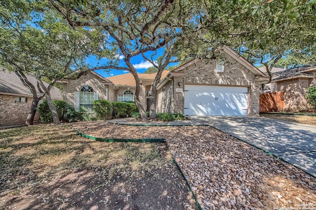 single story home with a garage