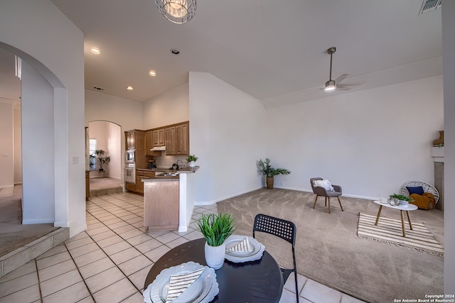 interior space with ceiling fan