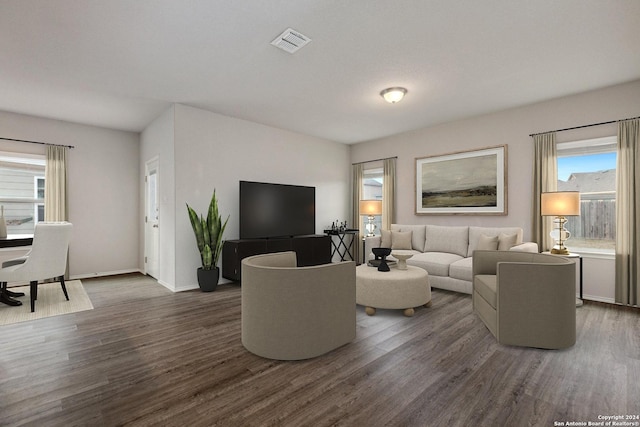 living room with dark wood-type flooring