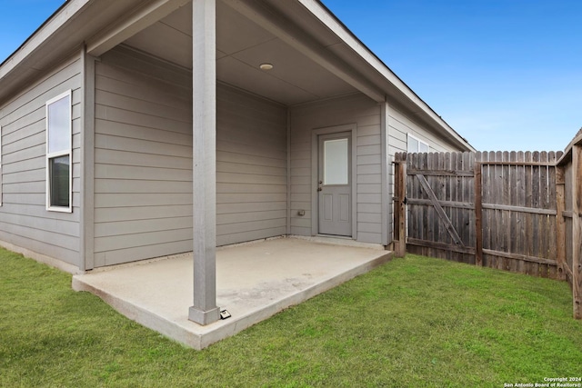 exterior space featuring a patio area and a yard