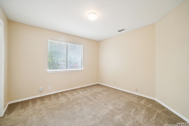 spare room with carpet flooring