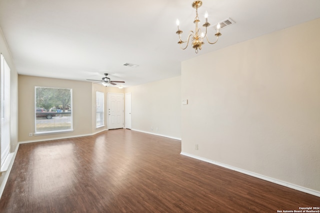 unfurnished room featuring dark hardwood / wood-style floors and ceiling fan with notable chandelier