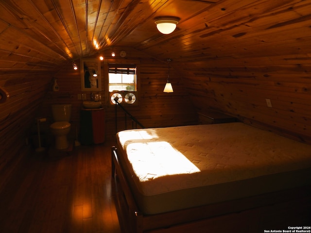 bedroom featuring dark wood-type flooring, vaulted ceiling, wood ceiling, and wooden walls