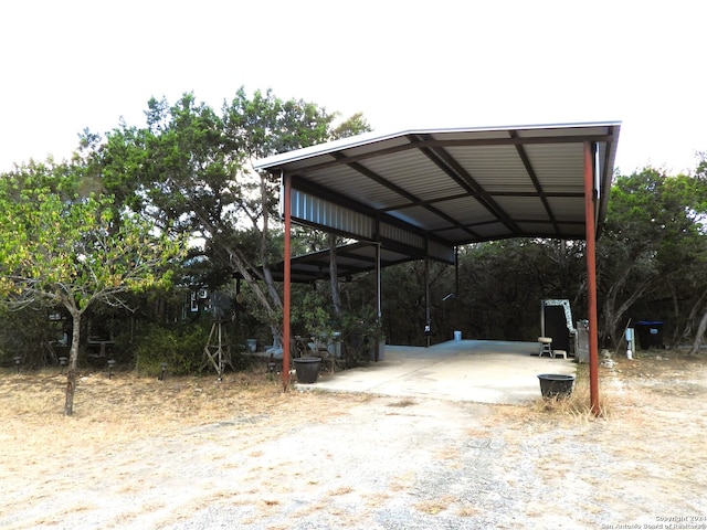 view of parking featuring a carport