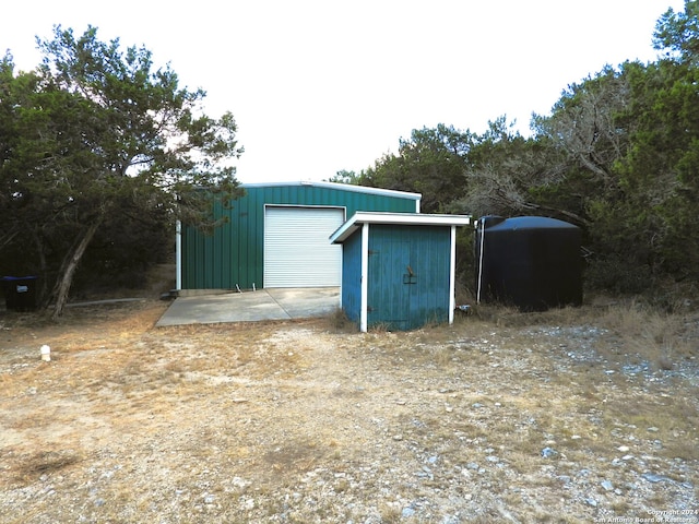 view of outbuilding featuring a garage