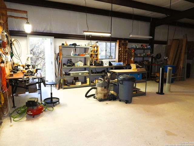 garage featuring a workshop area