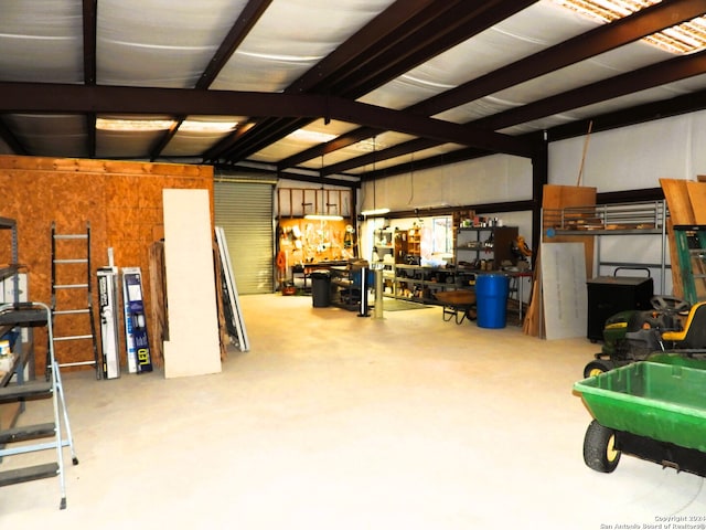 garage with a workshop area