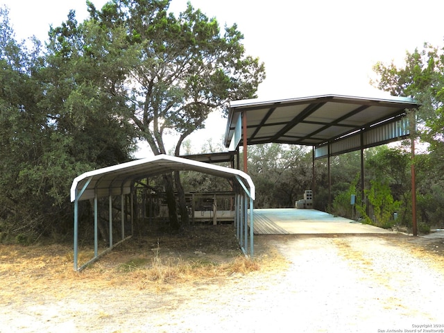 view of parking with a carport