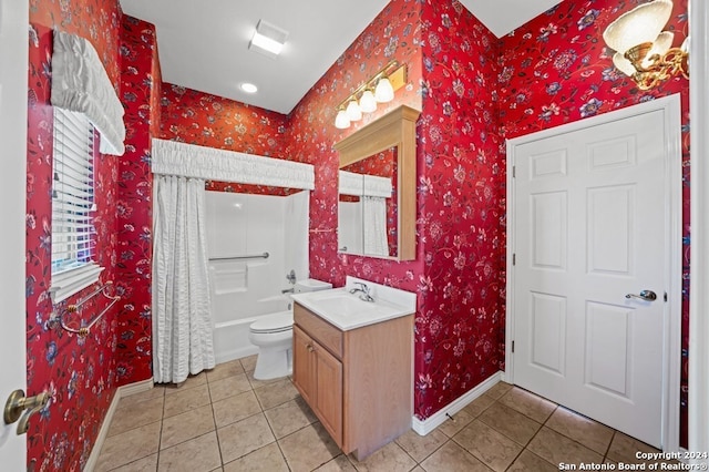 bathroom featuring toilet, vanity, and tile patterned floors