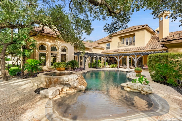 view of pool with a patio area and a pergola