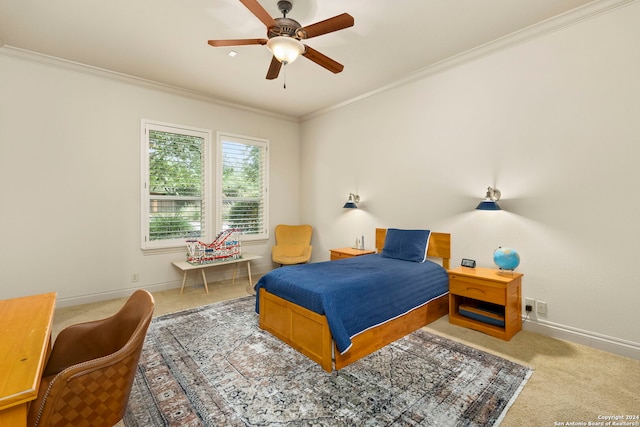 bedroom featuring carpet floors, baseboards, ornamental molding, and ceiling fan