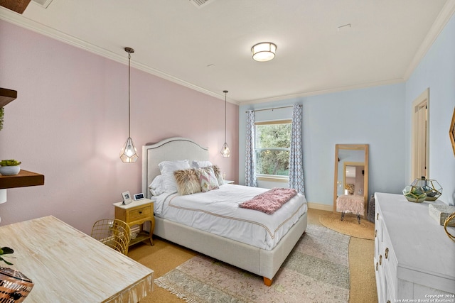 bedroom featuring ornamental molding, light carpet, and baseboards