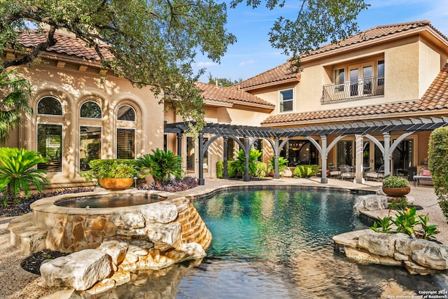 outdoor pool featuring a patio area, a pergola, and french doors