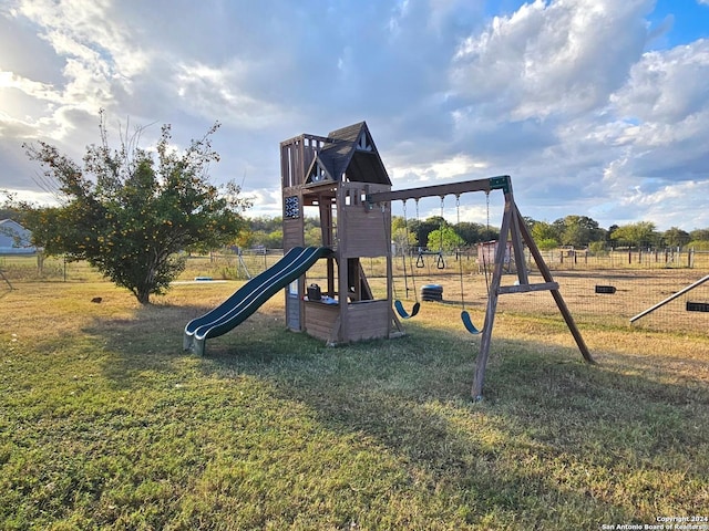 view of play area featuring a yard