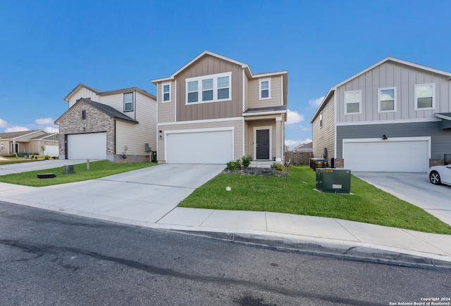 view of front of home featuring a garage, a front lawn, and central air condition unit