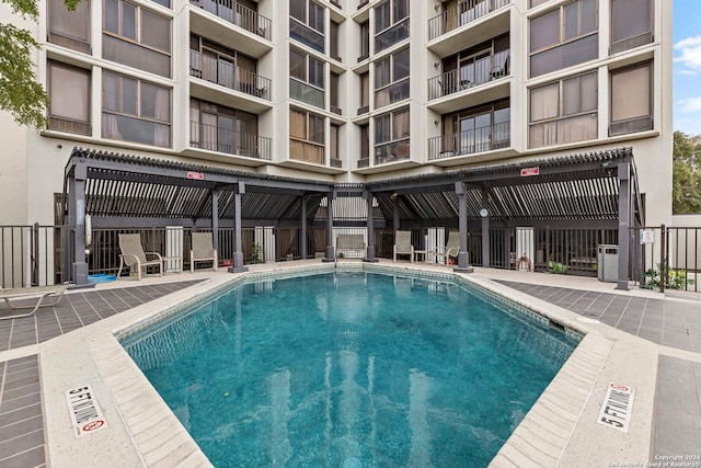 view of swimming pool featuring a patio