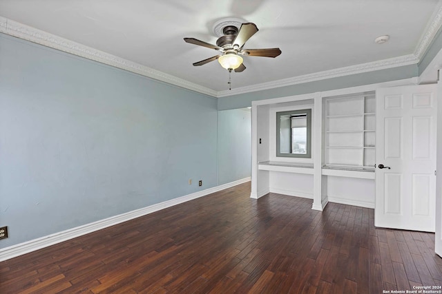 interior space with dark hardwood / wood-style flooring, crown molding, and ceiling fan