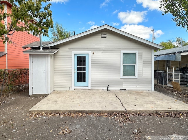 rear view of property with a patio