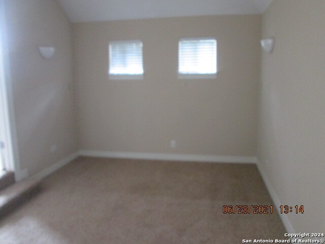 empty room with carpet floors