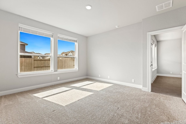 view of carpeted spare room