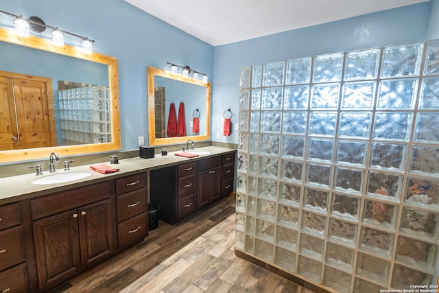 bathroom featuring vanity and hardwood / wood-style floors