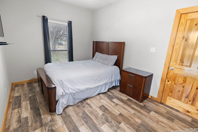 bedroom featuring light hardwood / wood-style floors