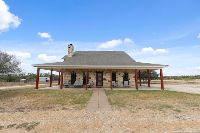 view of home's community with a yard and a patio area