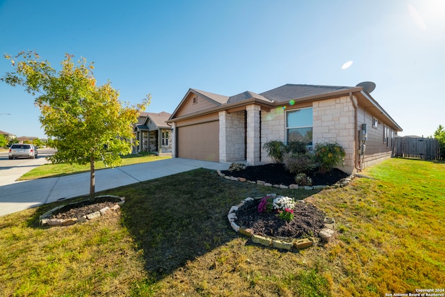 single story home featuring a front yard and a garage