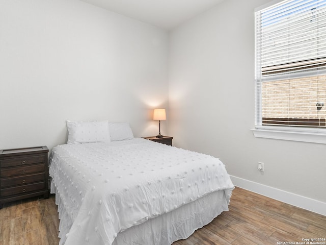 bedroom featuring hardwood / wood-style floors