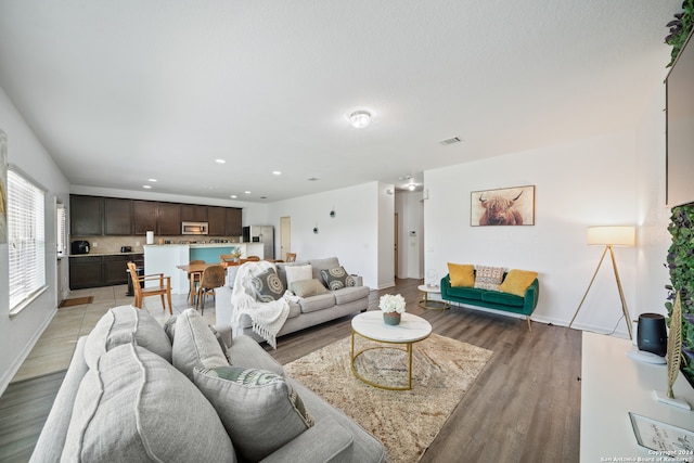 living room with hardwood / wood-style floors