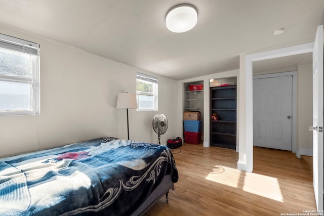 bedroom with wood finished floors