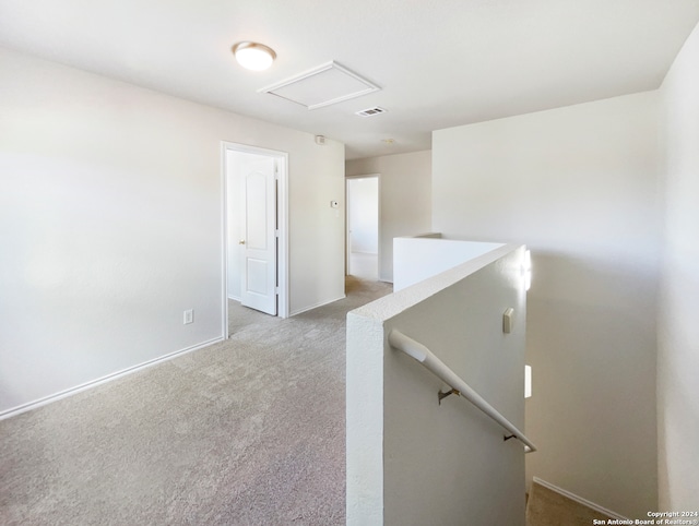 interior space featuring light colored carpet