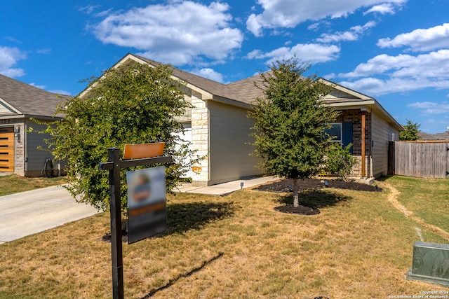 view of front of home with a front yard