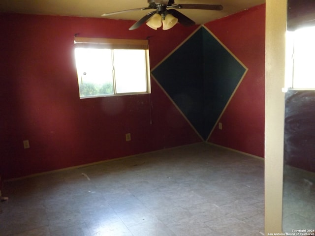 spare room featuring ceiling fan