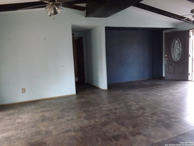 interior space with lofted ceiling with beams and ceiling fan