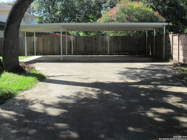 exterior space featuring a carport