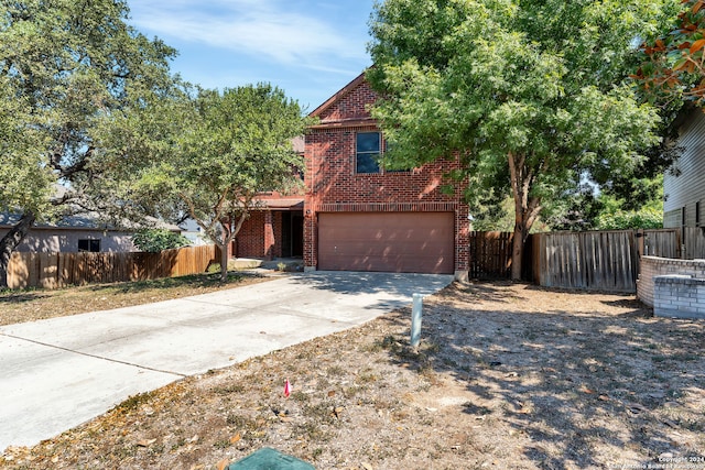 view of front of property featuring a garage