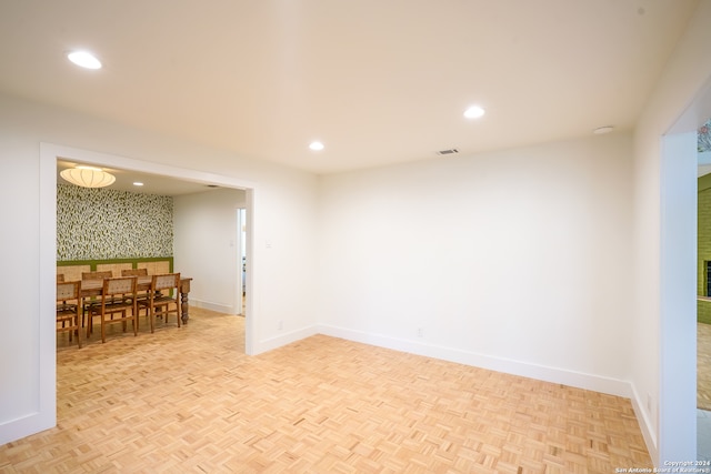 spare room with light parquet flooring