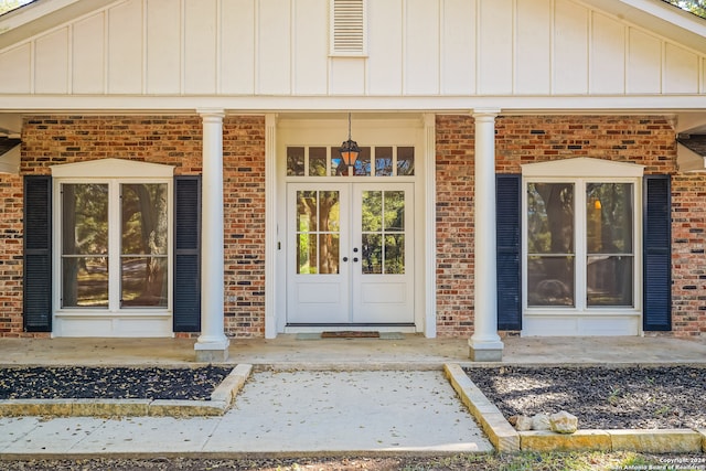 entrance to property featuring french doors