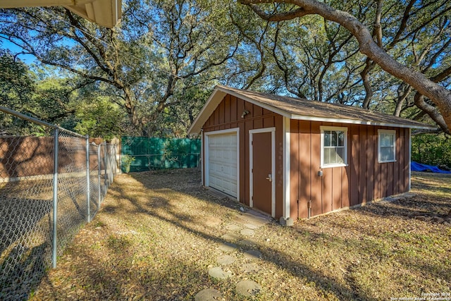 view of outdoor structure with a lawn