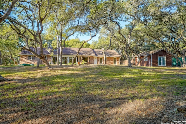 exterior space with a front yard