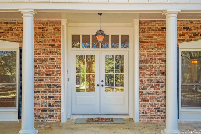 doorway to property featuring french doors