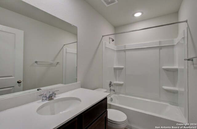 full bathroom featuring vanity, toilet, and shower / bath combination