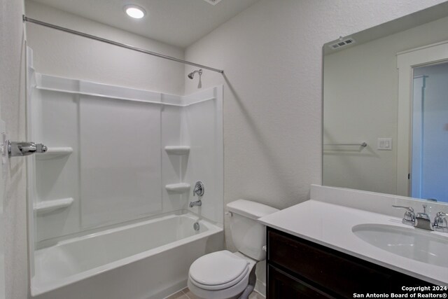 full bathroom with vanity, toilet, and shower / bathtub combination