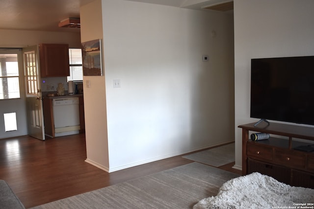 living room with dark hardwood / wood-style flooring