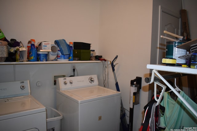 laundry area with separate washer and dryer