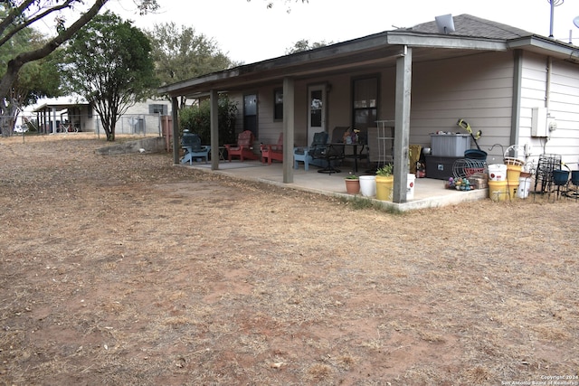 back of house featuring a patio area