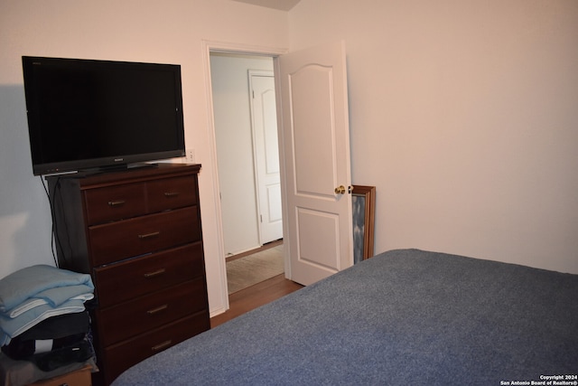 bedroom featuring hardwood / wood-style flooring