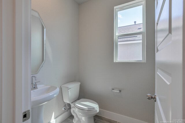 bathroom with toilet and sink