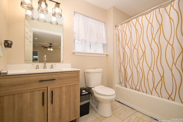 full bathroom with vanity, shower / tub combo with curtain, toilet, and ceiling fan